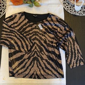 Sequin half sleeve Express Shirt. Color black and gold. Size small